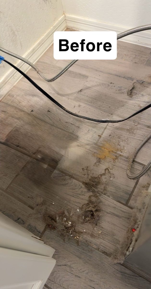 Laundry room floor before cleaning